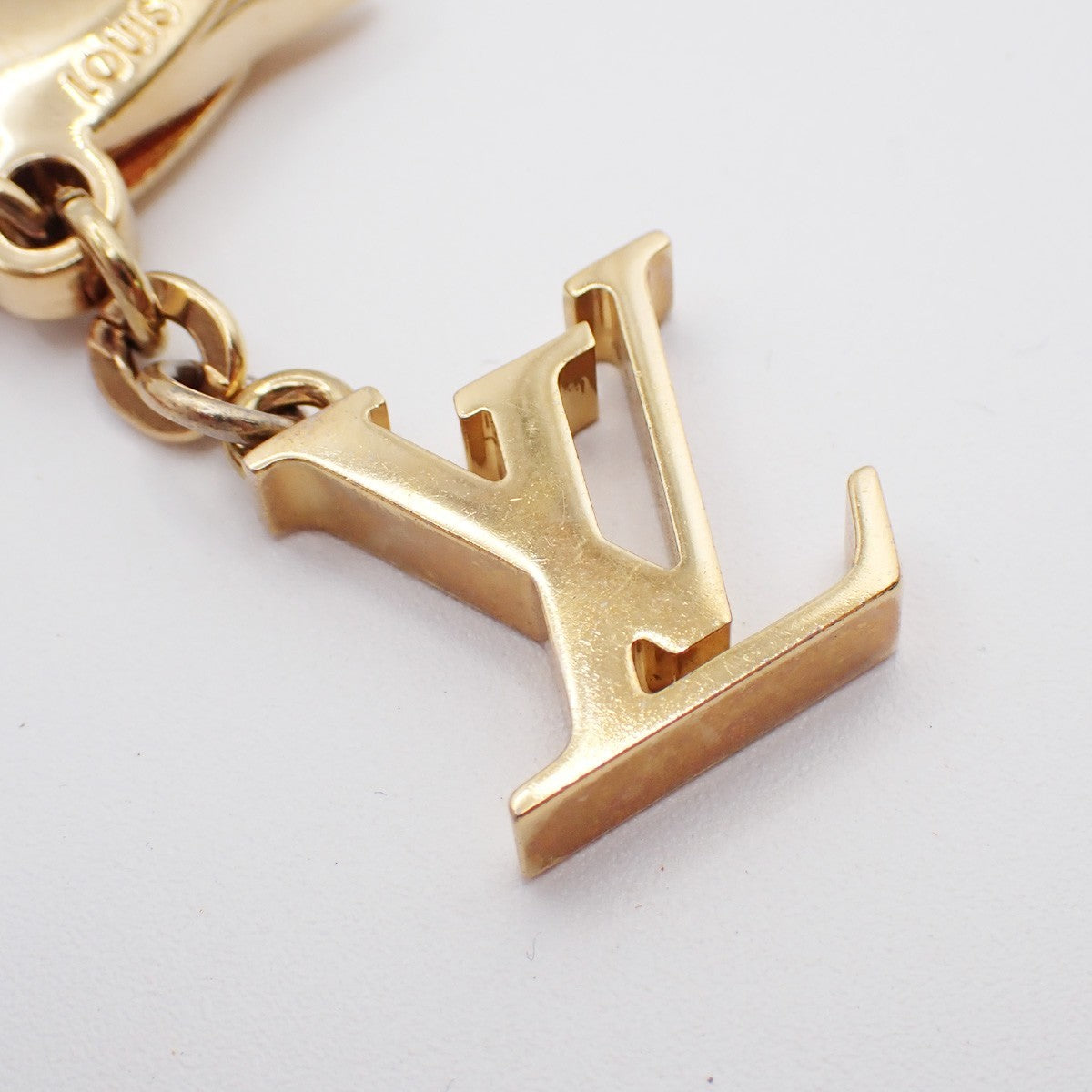 LOUIS VUITTON Hollow Flower Key Chain Gold-Plated Color Stone PK M66975 62EG068