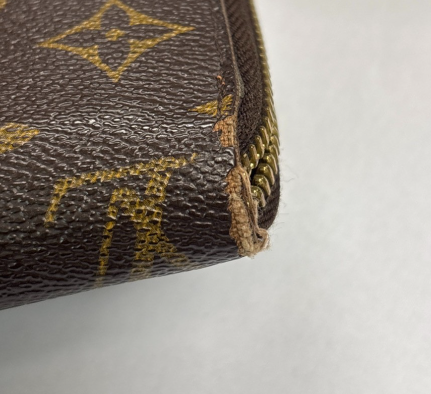 LOUIS VUITTON Logo Long Zippy Wallet Monogram leather Brown Spain M60017 04MA675