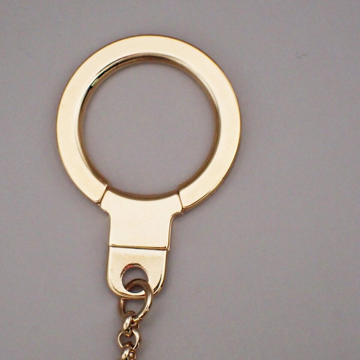 LOUIS VUITTON Porte Cles Glitter Mirror Ball Charm Key Ring GD M65379 64YG570