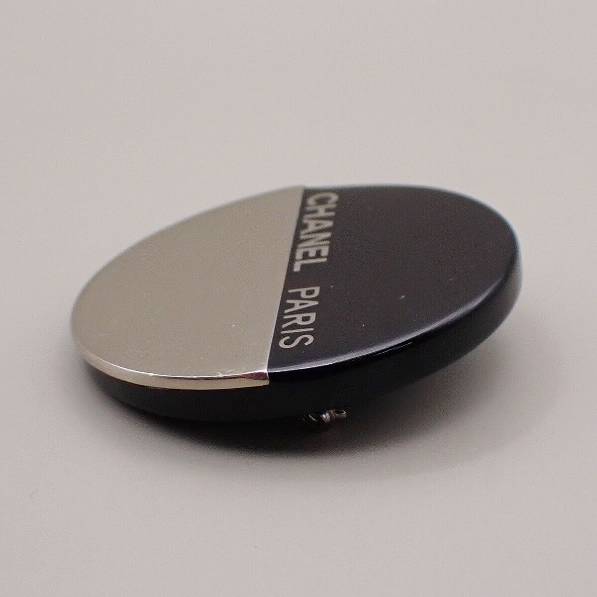 CHANEL Logo Round Bicolor Brooch 00A Metal Plastic Black Silver France 83YE496