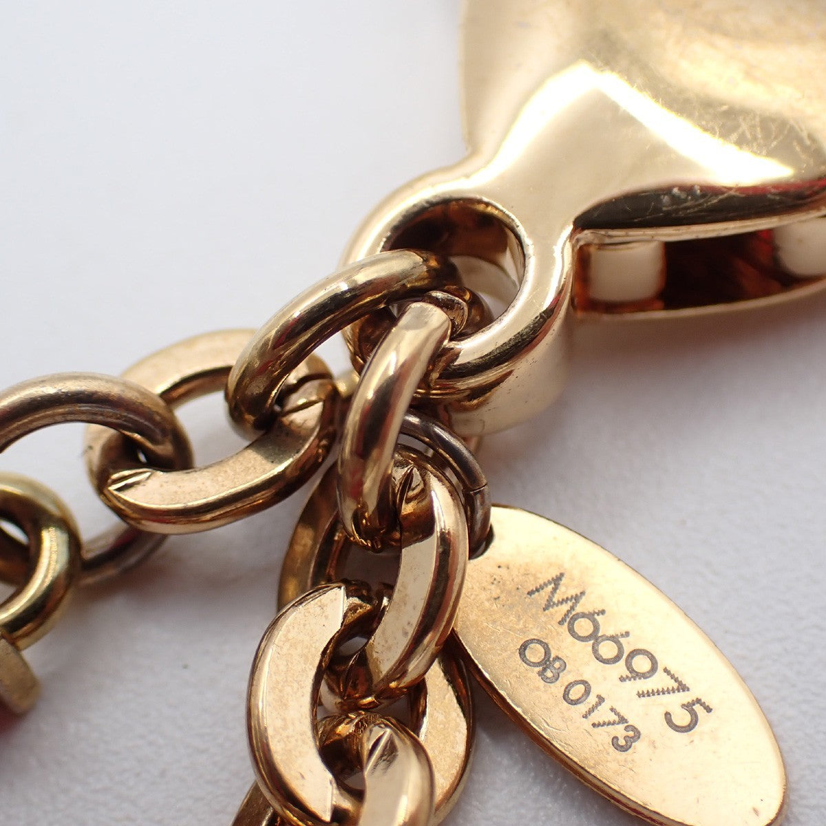 LOUIS VUITTON Hollow Flower Key Chain Gold-Plated Color Stone PK M66975 62EG068