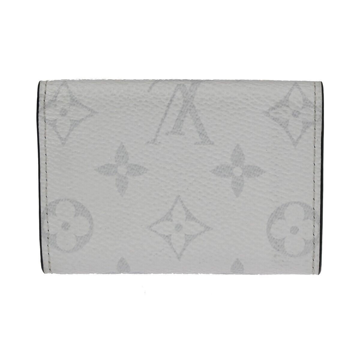 LOUIS VUITTON Discovery Compact Trifold Wallet Taigarama Leather M67621 39FA050