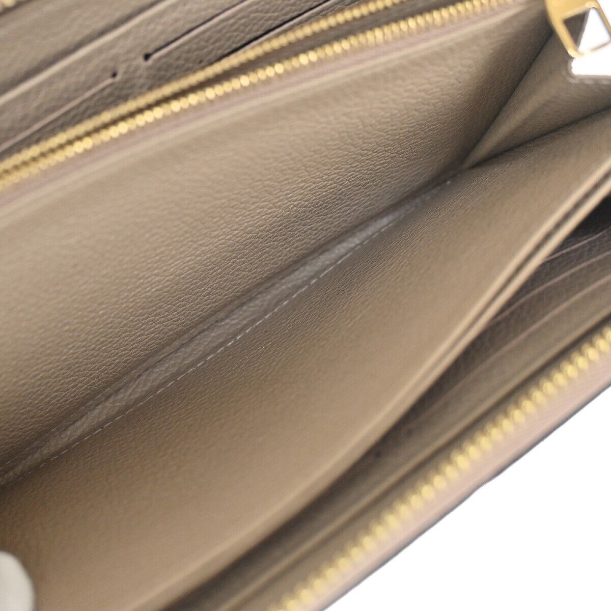LOUIS VUITTON Zippy Wallet Long Bifold Monogram Empreinte Beige M60738 86YC013