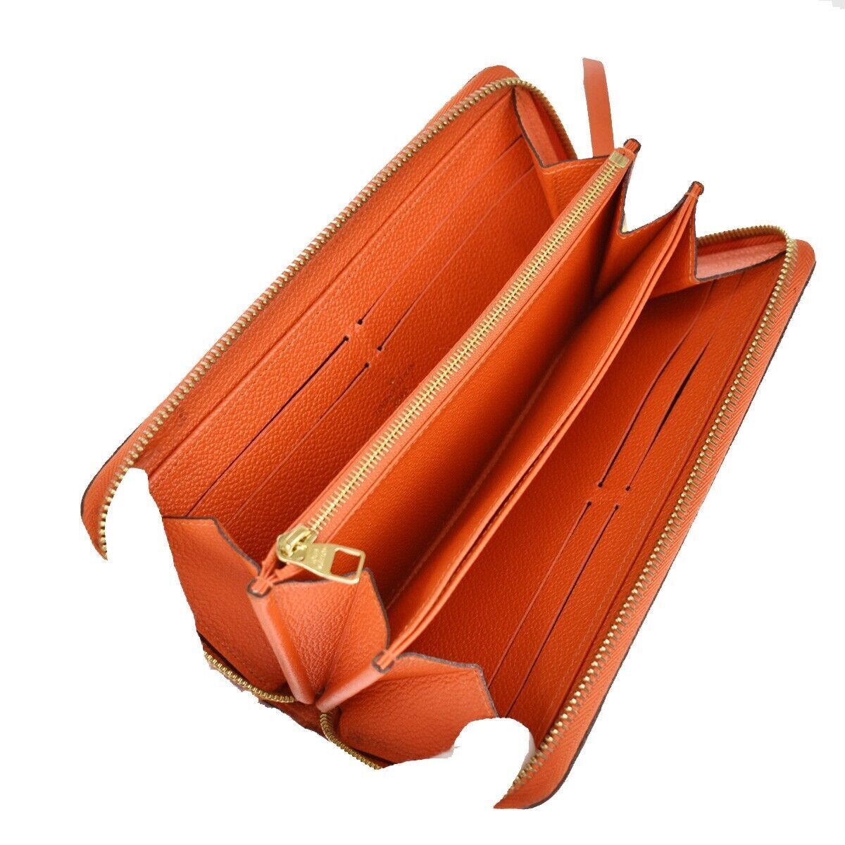 LOUIS VUITTON Long Zippy Wallet Monogram Empreinte Leather Orange M60775 69YB803