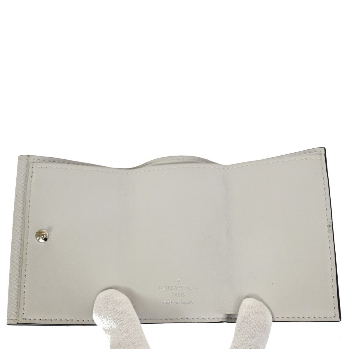 LOUIS VUITTON Discovery Compact Trifold Wallet Taigarama Leather M67621 39FA050