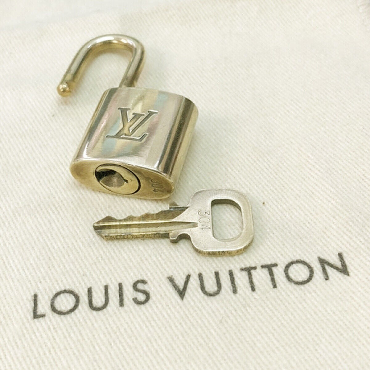 LOUIS VUITTON LV 10 SET PADLOCK KEY CHARM CADENA GOLD-PLATED FRANCE 34JF227