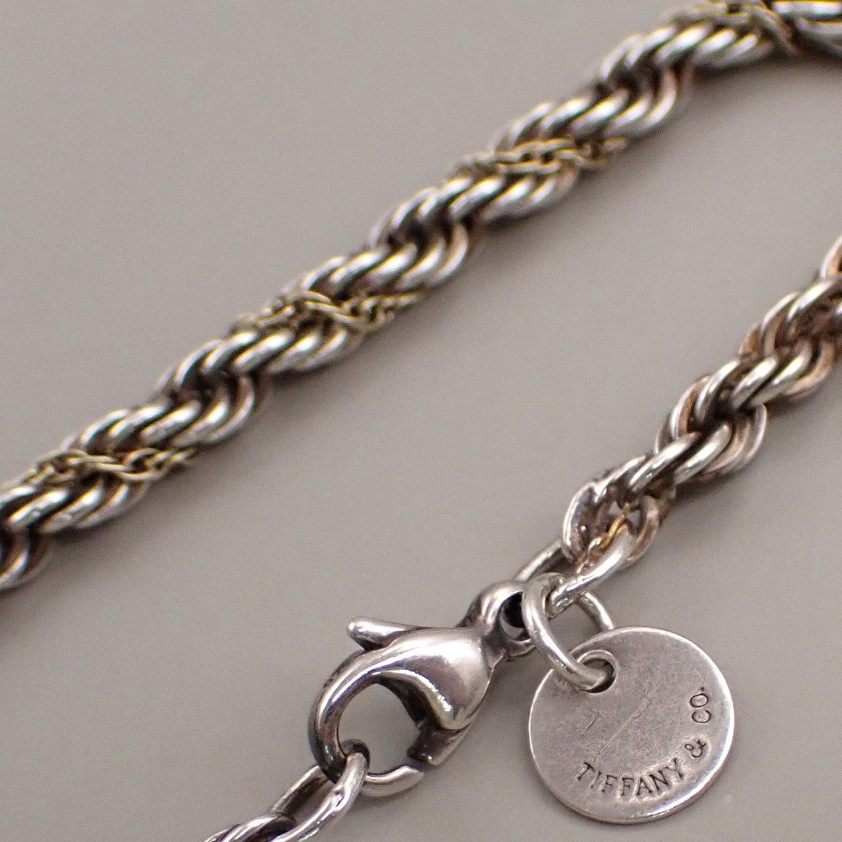 Tiffany & Co. Logo Sterling Silver and 18K Rope Twist Bracelet 69YH737