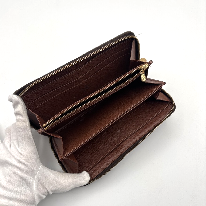 LOUIS VUITTON Logo Long Zippy Wallet Monogram leather Brown Spain M60017 04MA675
