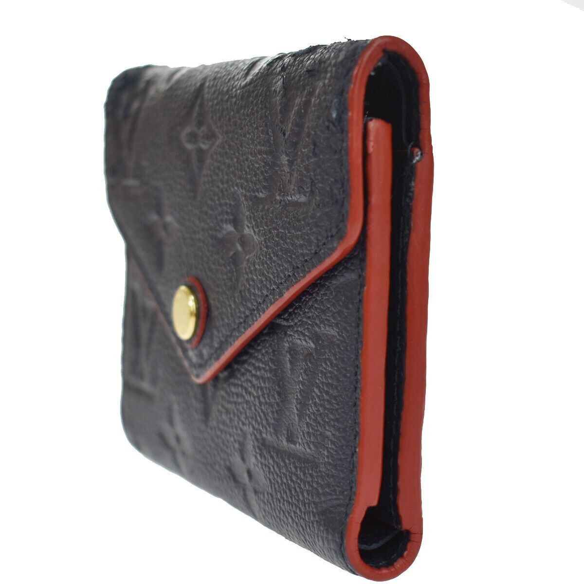 LOUIS VUITTON Victorine Trifold Wallet Monogram Empreinte Leather M64577 31GA841