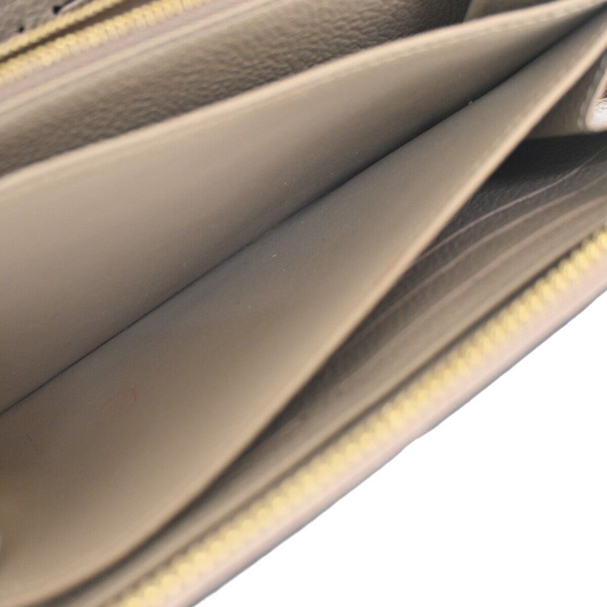 LOUIS VUITTON Zippy Wallet Long Bifold Monogram Empreinte Beige M60738 86YC013
