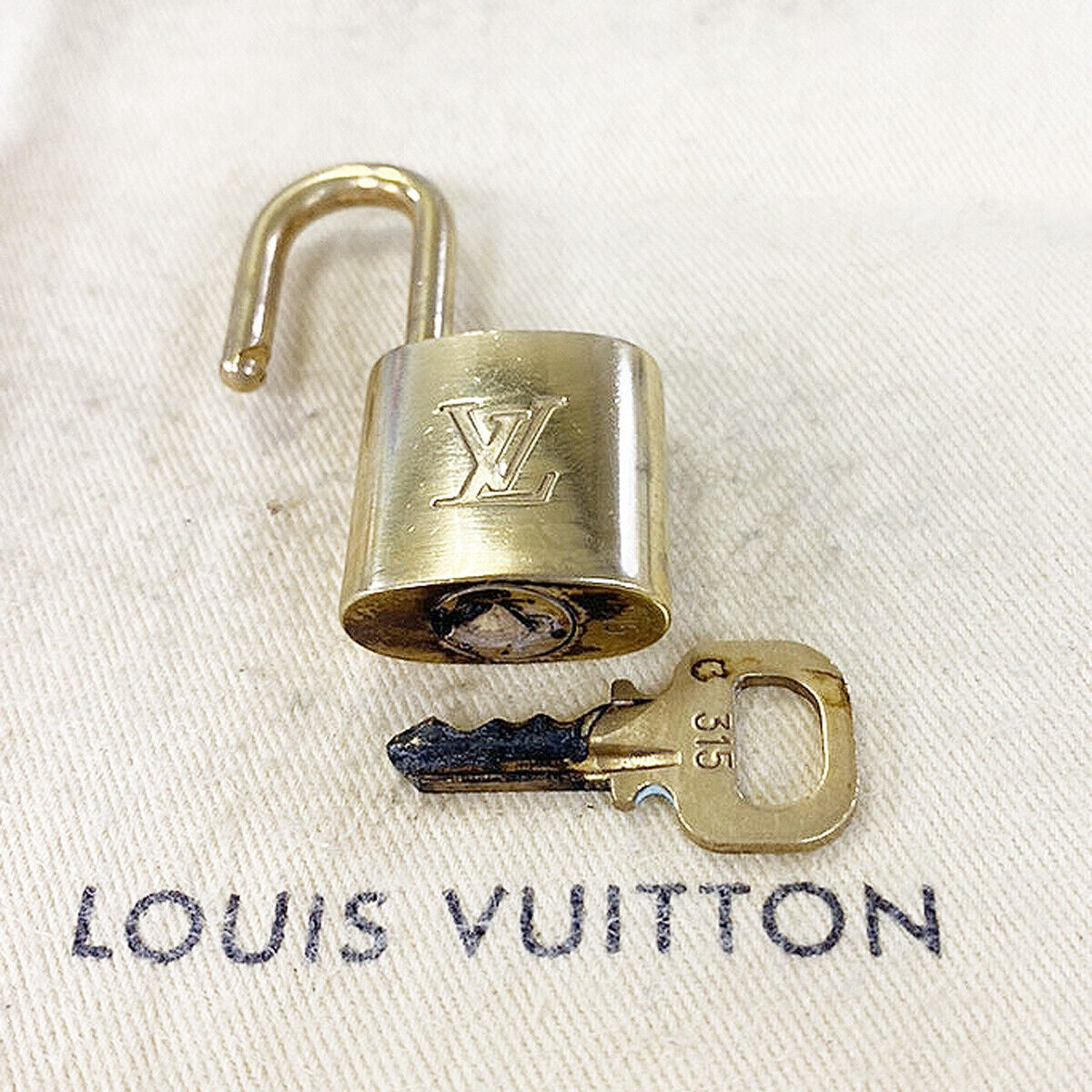 LOUIS VUITTON LV 10 SET PADLOCK CADENA KEY BAG CHARM GOLD PLATED FRANCE 33MS879