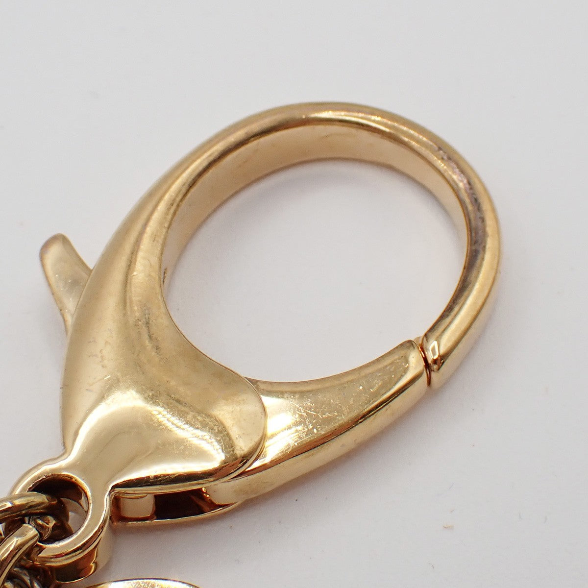 LOUIS VUITTON Hollow Flower Key Chain Gold-Plated Color Stone PK M66975 62EG068