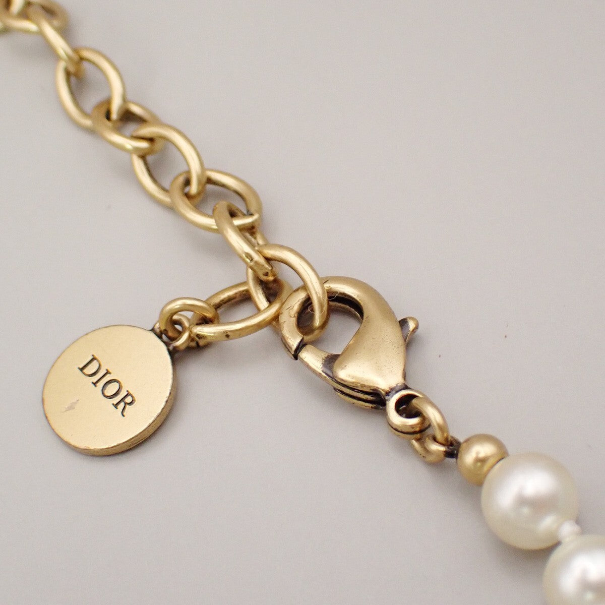 CHRISTIAN DIOR Logo Tribal Imitation Pearl Necklace White Gold 88RK382