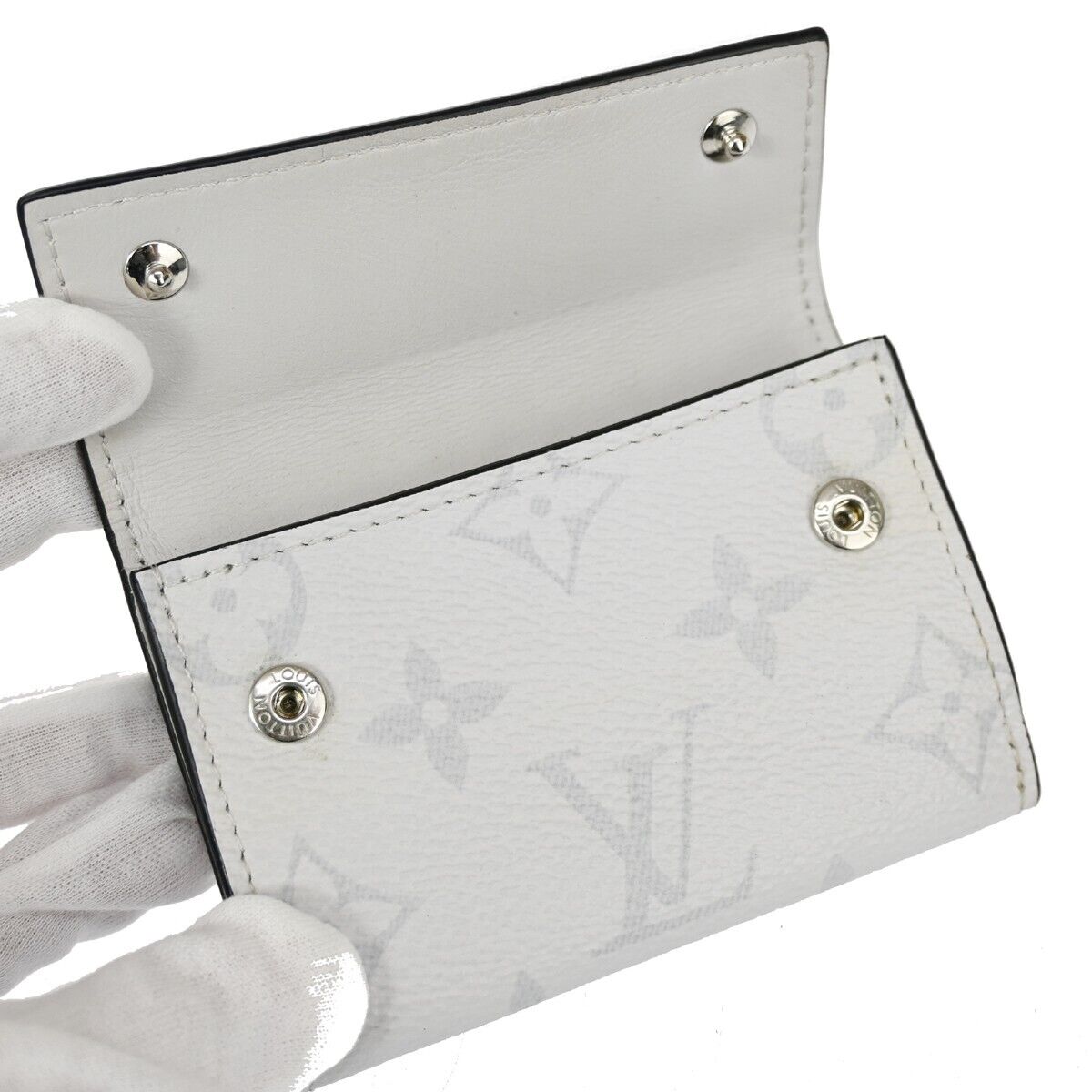 LOUIS VUITTON Discovery Compact Trifold Wallet Taigarama Leather M67621 39FA050