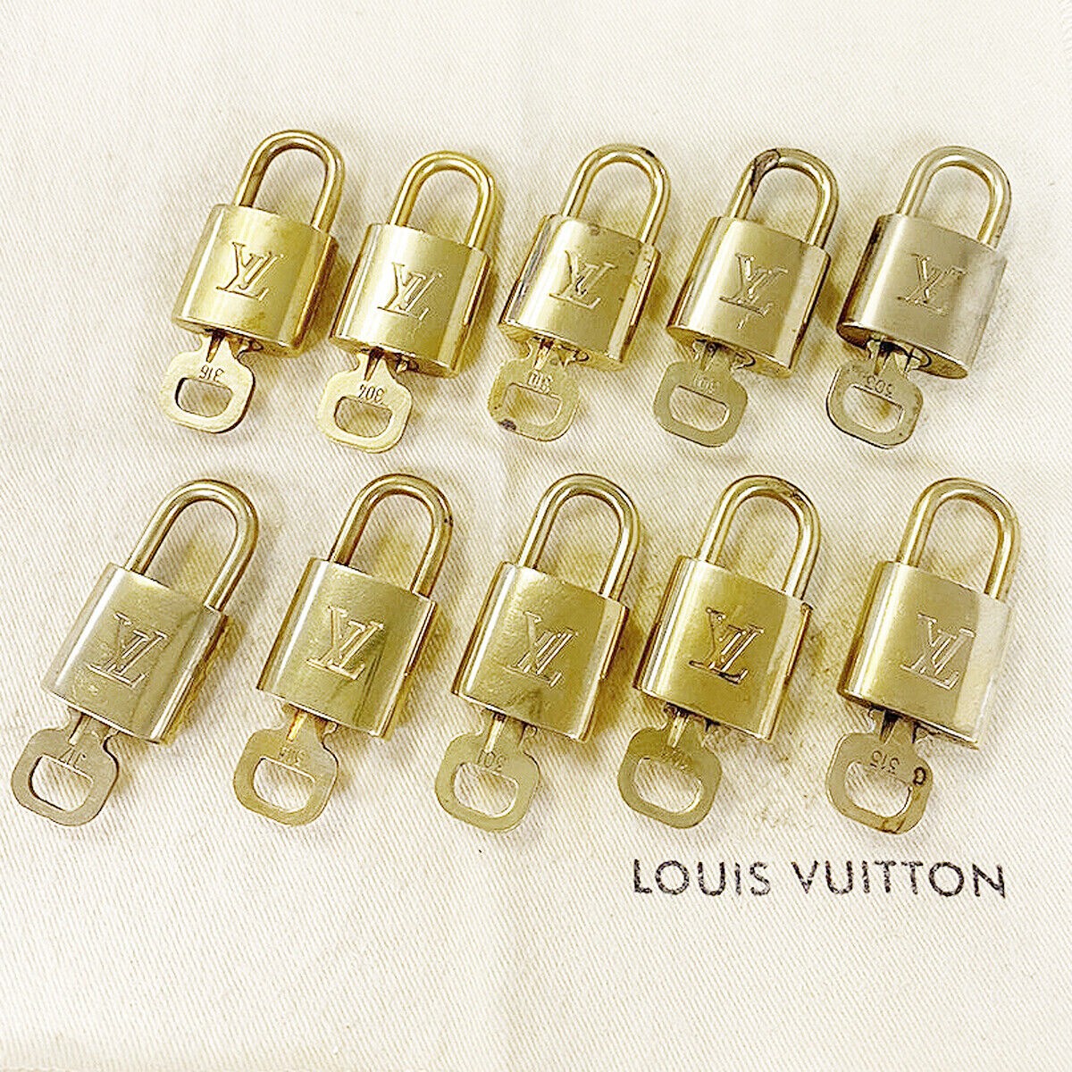 LOUIS VUITTON LV 10 SET PADLOCK CADENA KEY BAG CHARM GOLD PLATED FRANCE 33MS879