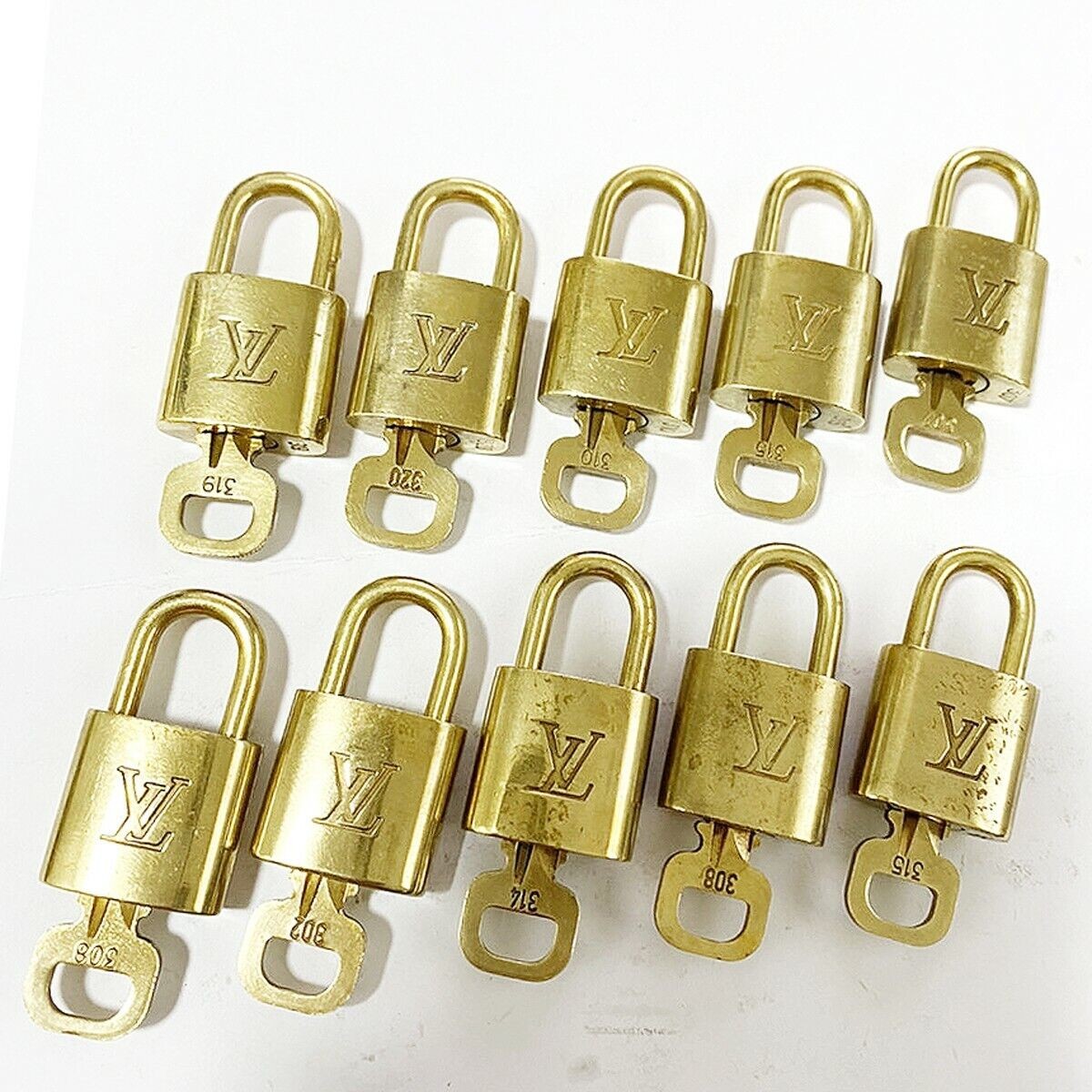 LOUIS VUITTON LV 10 SET PADLOCK KEY BAG CHARM CADENA GOLD-PLATED 35MT006