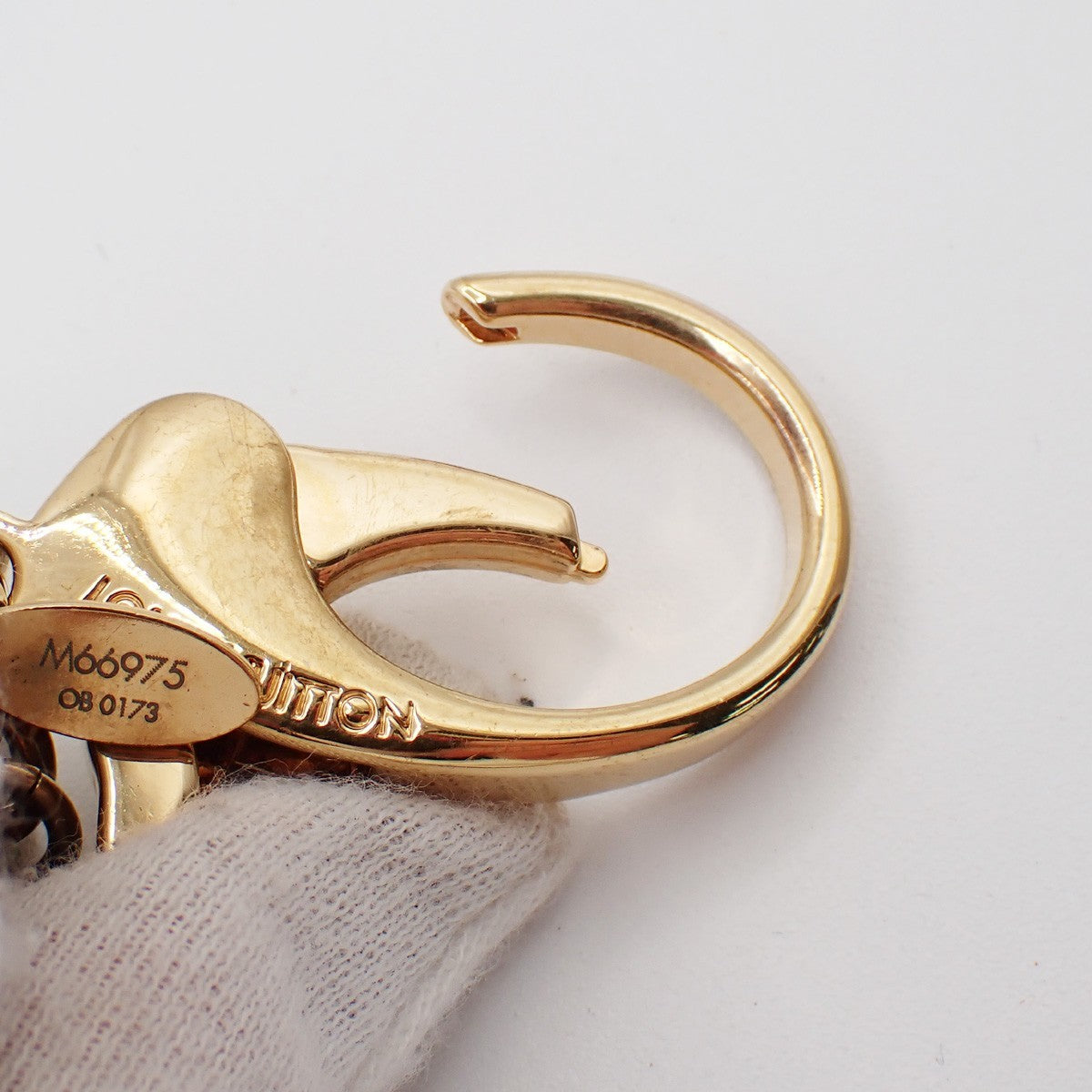 LOUIS VUITTON Hollow Flower Key Chain Gold-Plated Color Stone PK M66975 62EG068