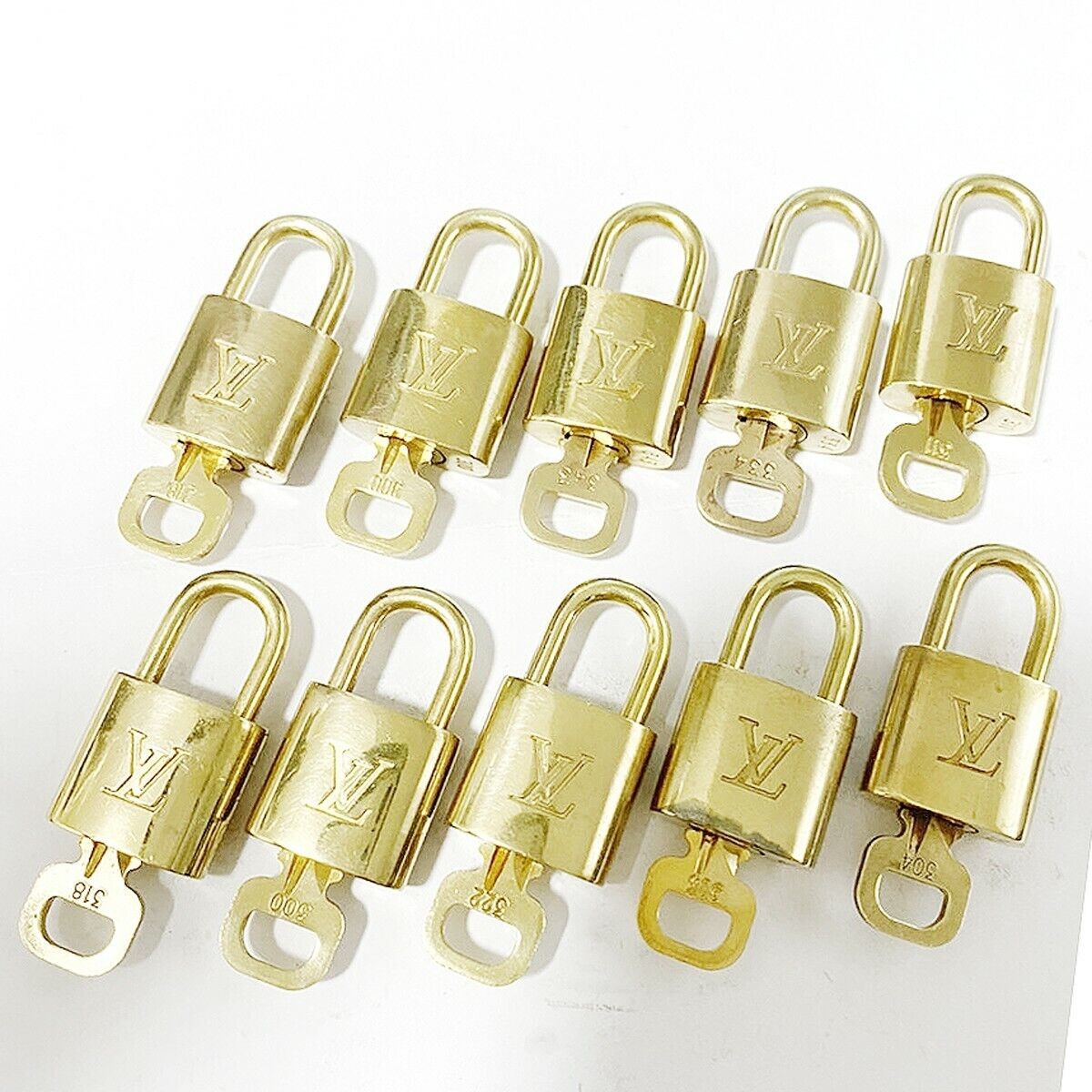 LOUIS VUITTON LV 10 SET PADLOCK KEY BAG CHARM CADENA GOLD-PLATED FRANCE 36MT010