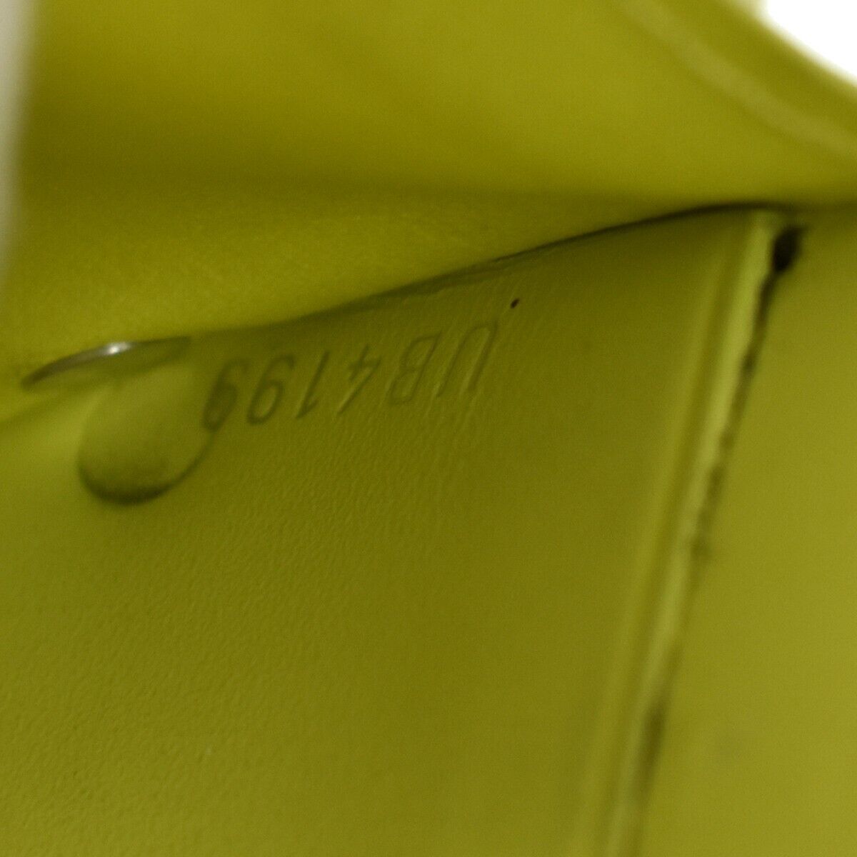 LOUIS VUITTON Discovery Compact Trifold Wallet Taigarama Leather M67629 38GA437