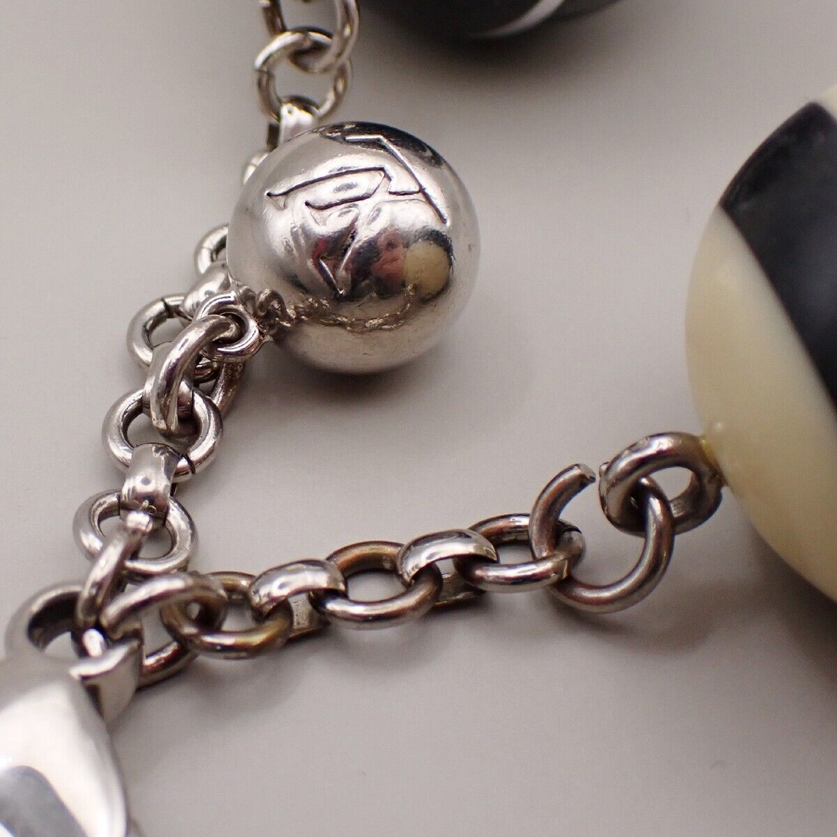 LOUIS VUITTON Logo Bijoux Sac Mini Lin Bag Charm Silver Black M65701 61YG571