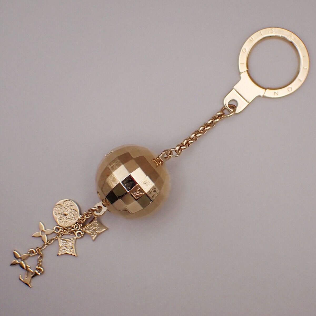 LOUIS VUITTON Porte Cles Glitter Mirror Ball Charm Key Ring GD M65379 64YG570